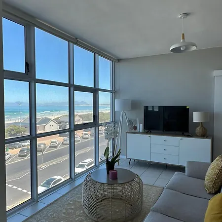 Charming Beachfront Strand Apartment Cape Town Exterior photo