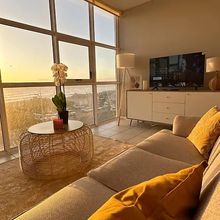 Charming Beachfront Strand Apartment Cape Town Exterior photo