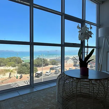 Charming Beachfront Strand Apartment Cape Town Exterior photo
